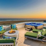 Rooftop deck on Newport Beachfront home with fire pit and spa