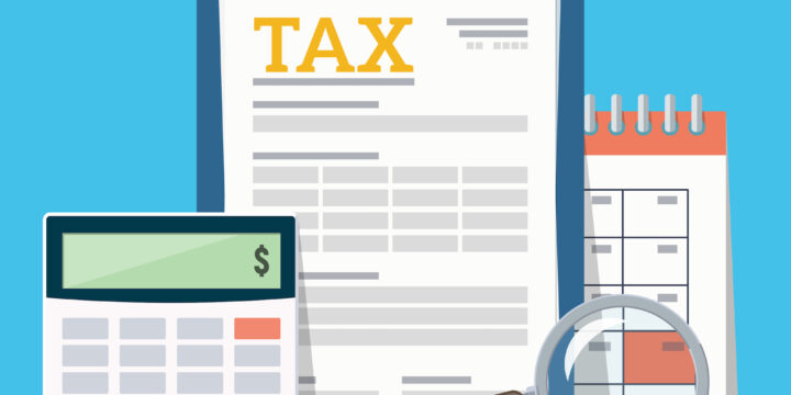 tax time graphic with calculator in front