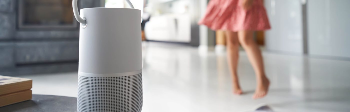 smart speaker with person dancing in background