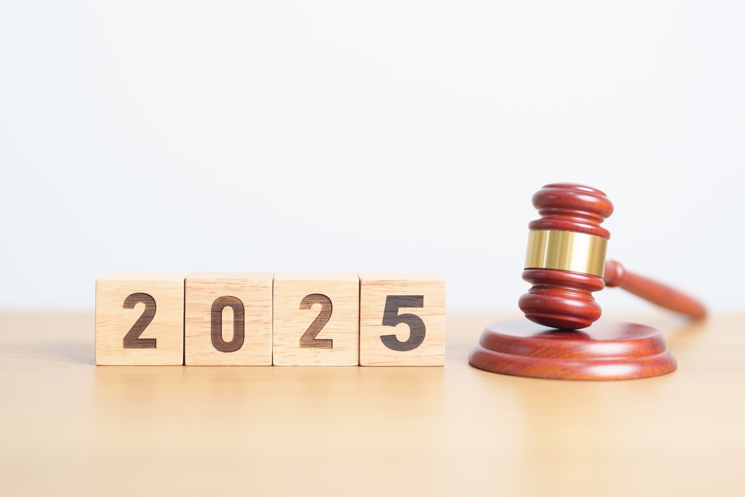 judge hammer with "2025" in blocks - new laws for 2025