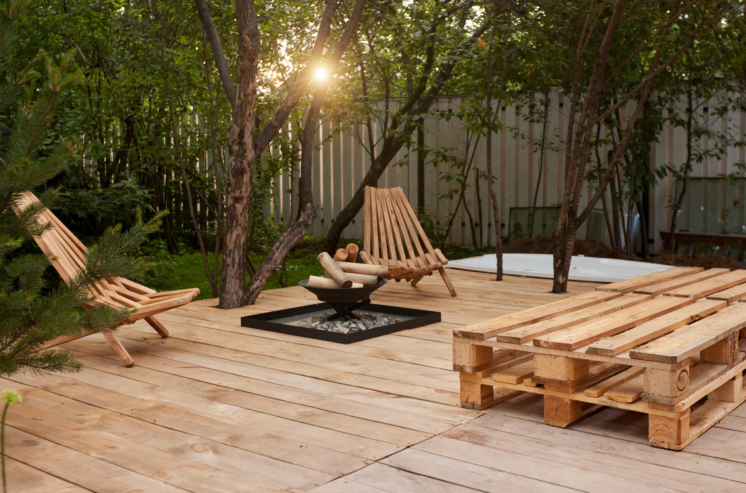 exterior of backyard with sunset, nice wood patio.