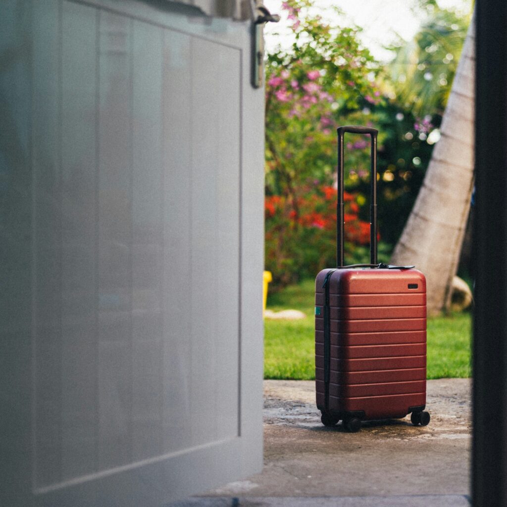 suitcase outside of door