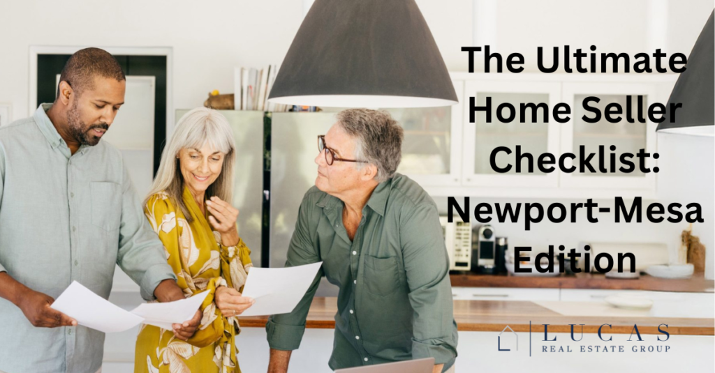 photo of couple with real estate agent at a kitchen table reviewing documents
