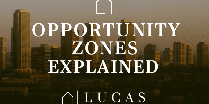 Promotional graphic featuring the phrase "Opportunity Zones Explained" in bold white text centered over a city skyline at sunset, with the official Lucas Real Estate Group logo at the bottom center on a transparent background.