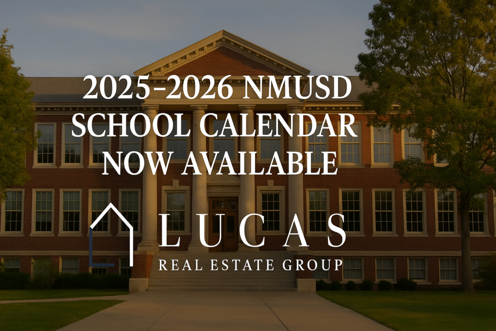 Classical red brick school building with white columns in the background. Centered overlay text reads ‘2025–2026 NMUSD School Calendar Now Available.’ The Lucas Real Estate Group logo is displayed prominently at the bottom, maintaining its original design and colors.