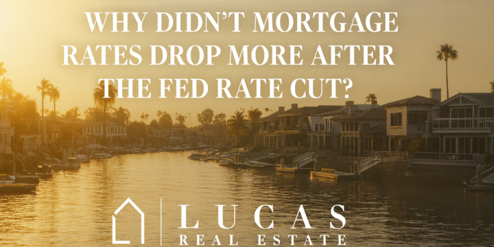 lassy waterfront scene at sunset with luxurious homes reflecting on calm water. The text reads, “Why Didn’t Mortgage Rates Drop More After the Fed Rate Cut?” with the Lucas Real Estate logo centered below, maintaining a professional and high-end aesthetic.
